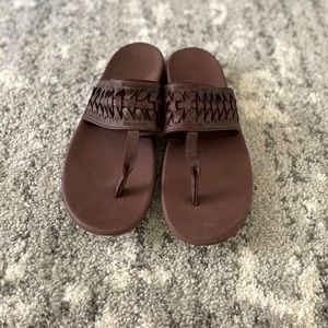Brown flip flops